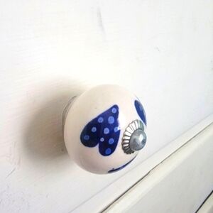 (4) Ceramic cabinet knobs or drawer pulls
